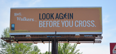 Photo of pedestrian safety billboard.